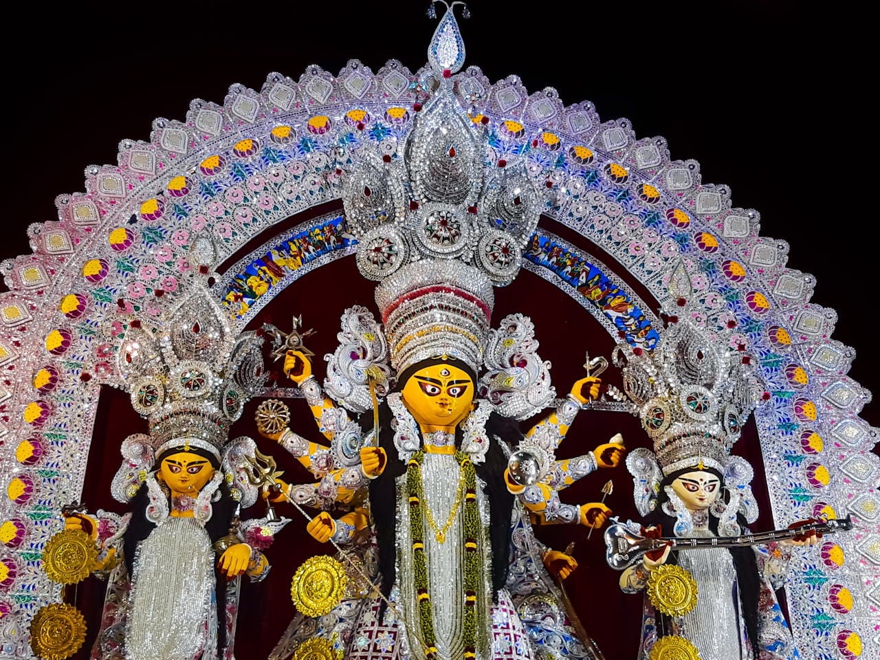 Colorful depiction of Goddess Durga during a vibrant Durga Puja festival in Kolkata, India.